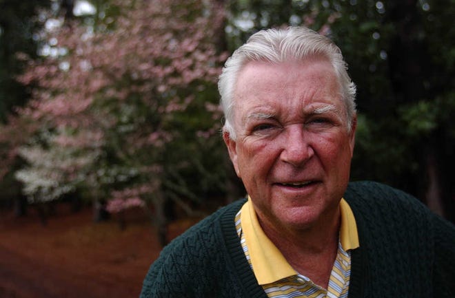 Ken Venturi poses for a portrait outside the CBS compound behind the Par 3 course at Augusta National Golf Club in 2002.