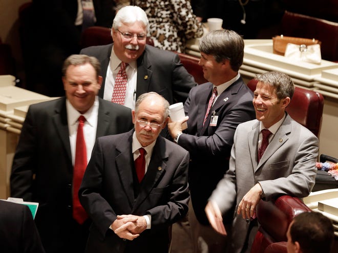 DAVE MARTIN | ASSOCIATED PRESS | FILE
Republican House members gather Feb. 13 at the start of the regular legislative session at the Alabama Statehouse in Montgomery. With the Republican-controlled Legislature repeatedly making it clear that new taxes are off the table, lawmakers are increasingly turning to bond issues to provide money. From left are Rep. Ken Johnson of Moulton, Rep. Alan Harper of Aliceville (rear), Rep Jim McClendon of Springville, Rep. Barry Moore of Enterprise and Rep. Ed Henry of Hartselle.