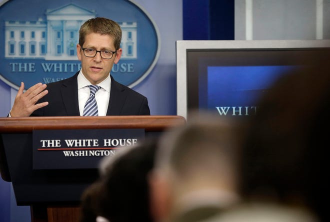 White House Press Secretary Jay Carney gestures as he speaks during his daily news briefing at the White House in Washington, Monday, May, 20, 2013. Carney spoke on various subjects including the recent scandals involving the IRS and Justice Department. (AP Photo/Pablo Martinez Monsivais)
