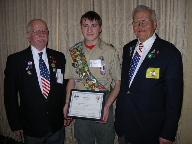 Ethan Snyder (center), an Eagle Scout from Troop 112 in Edgewater Park, received a $250 scholarship from Edgewater Park Elks Lodge 2550, with Past Exalted Rulers Henry Freck (left) and Bill Chappell handling the presentation.