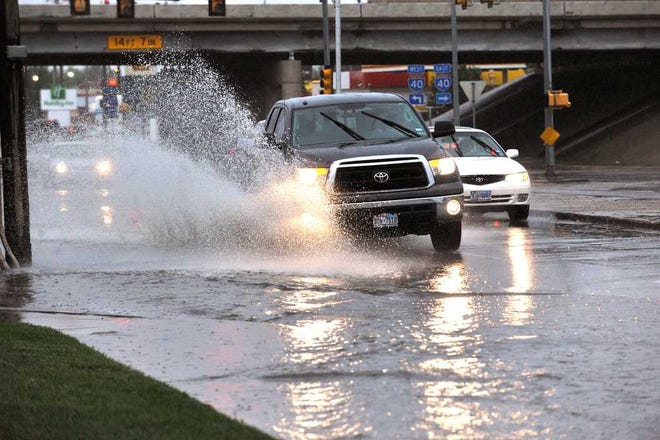 Morning rain showers fell on the Amarillo area Tuesday, creating temporary flooding on South Osage Street near Interstate 40. Government and American Red Cross officials are planning for the possibility of severe weather in Amarillo's future.