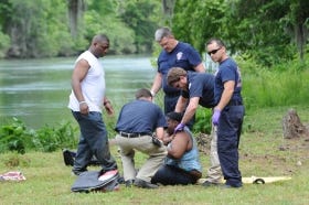 A kayak instructor and a man and his wife were swept under the canal headgates and had to be helped out of the water about 150-yards down stream. A woman with injuries that were not life-threatening was transported to the hospital.
