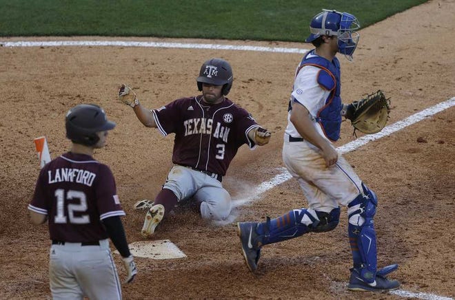 Dave Martin Associated Press Texas A&M's Jace Statum (3) steals home as Florida catcher Taylor Gushue awaits the throw in the eighth inning of their SEC Tournamen game on Tuesday in Hoover, Ala. At left is the Aggies' Cole Lankford. Texas A&M beat Florida 6-3.