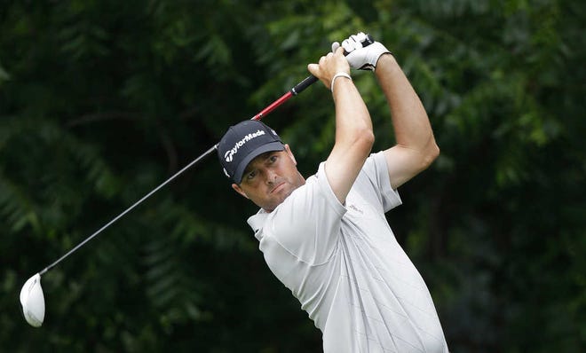 Ryan Palmer watches his tee shot on the sixth hole during the first round of the Colonial golf tournament Thursday, May 23, 2013, in Forth Worth, Texas. (AP Photo/LM Otero)