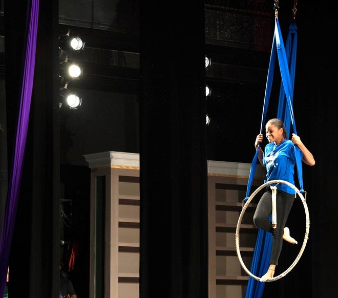 Sherron Mitchell performs on a hoop high above the stage last year during Starfish Circus at Ocala Civic Theatre. This year's Starfish student performance runs June 28-29 at the theater.