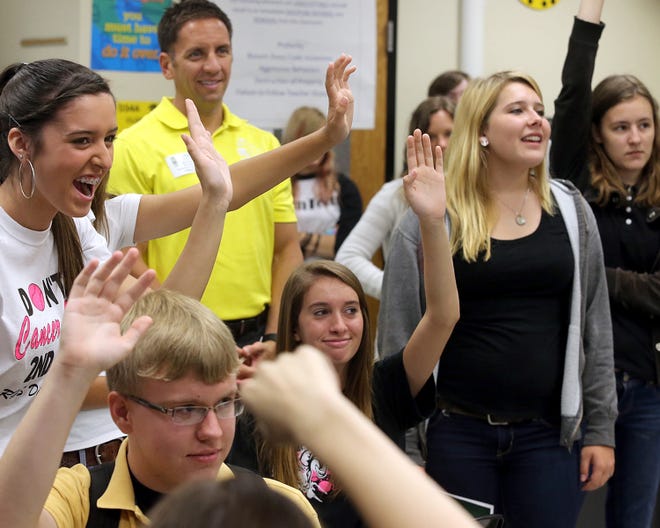 Students participate in a question-and-answer session after the Panama City Beach Chamber of Commerce’s financial literacy simulation workshop at Rutherford High School on Thursday.