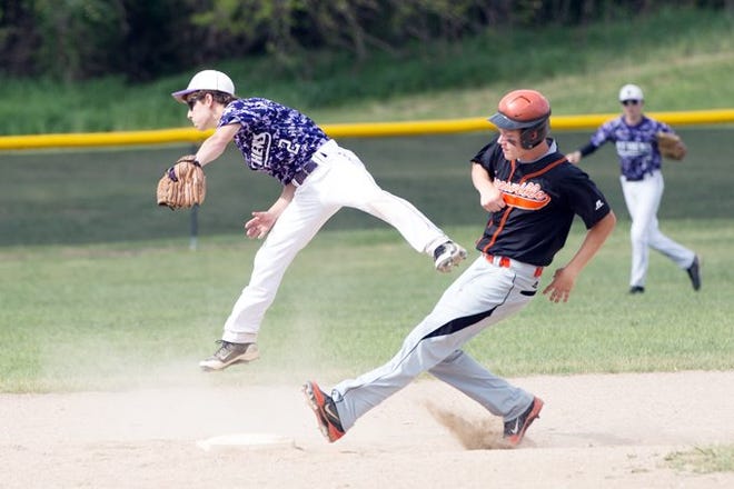 Jonesville's Kyle Jones makes it safely to second game during Tuesday's doubleheader against Athens. Jim Drews photo