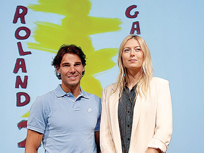 Spain's Rafael Nadal, left, and Russia's Maria Sharapova pose during the draw for the 2013 French Open.
CHRISTOPHE ENA | THE ASSOCIATED PRESS