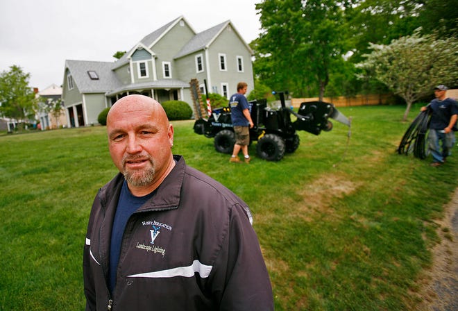 Check out lane, lawn irrigation. Erik Vaisey owner of Vaisey Irrigation talks about lawn Irrigation which he installs on the South Shore. This lawn is in Marshfield.Thursday May 23, 2013.