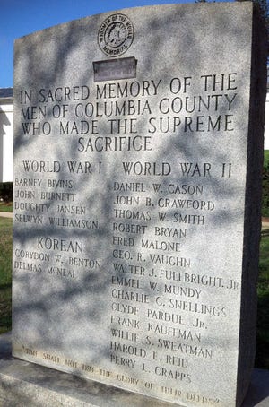 The Woodmen of the World erected a granite monument to the fallen from World War I, World War II and the Korean War on the grounds of the old courthouse in Appling.