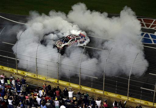 Kevin Harvick (29) does a burnout after winning on Sunday.