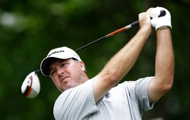Boo Weekley watches his tee shot on the sixth hole during the final round of the Colonial on Sunday.