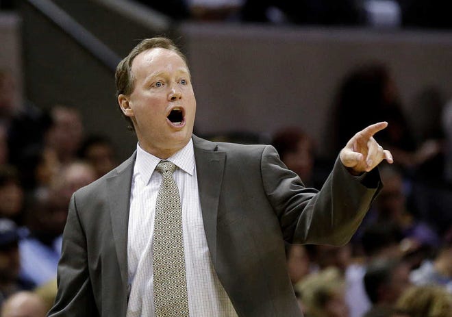 San Antonio assistant coach Mike Budenholzer will replace Larry Drew as head coach of the Atlanta Hawks.