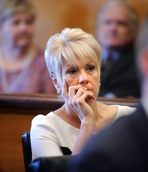 Jeanne Sweeney Mooney listens to testimony at Framingham District Court.
Wicked Local Staff Photo/Allan Jung