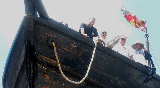 Pictured with the recently placed anchor are Espiritu crew members are Nick Hoffas, K.C. Kramer, Will Eckardt and Capt. Ken Thomas. Contributed photo.