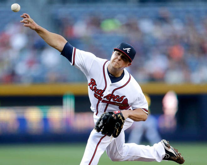 Atlanta Braves starting pitcher Kris Medlen throws in the first inning of a baseball game against the Toronto Blue Jays, Wednesday, May 29, 2013, in Atlanta. (AP Photo/David Goldman)