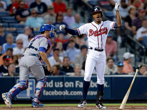 Atlanta Braves' B.J. Upton throws his bat on the ground after striking out to end the fourth inning of Wednesday's game against the Toronto Blue Jays in Atlanta. (David Goldman | Associated Press)