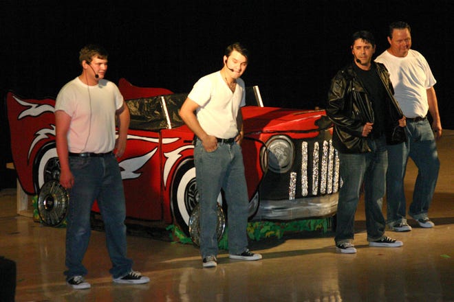 Randall Searcy, Felipe Martinez, Robert Brown and Vernon Clark perform “Greased Lightnin” during the Iberville Community Theatre's production of the musical “Grease” on Wednesday night at the Carl F. Grant Civic Center. 
POST SOUTH PHOTO/Peter Silas Pasqua