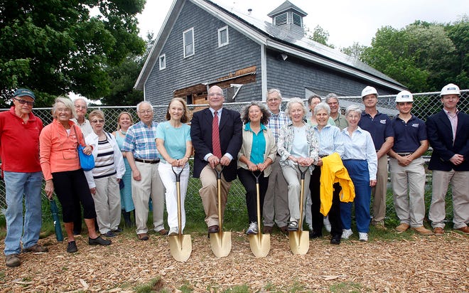 The shovelholders are, from left to right, Broadmoor Chair Advisor Board member Jeannette Reynolds, Mass Audubon President Henry Tepper, Broadmoor Sanctuary Director Elissa Landry, and Broadmoor Chair Campaign Committee member Margaret Robinson. The four are shown with other Broadmoor Wildlife Sanctuarymembers and friends during the groundbreaking ceremony at the South Natick locale on May 23.