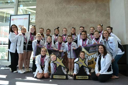 Submitted photo - Members of the Wallkill Valley Elite cheer and dance teams sport their champion jackets.