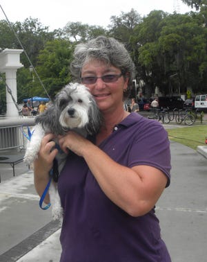 Winner of the owner and dog look alike contest Jada Godbee and Bandit. (Katie Martin/Savannah Morning News)
