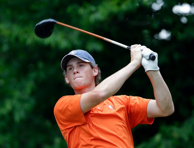Illinois' Thomas Detry hits from the tee on the 12th hole during the final round of play in the NCAA college men's golf championship against Alabama, Sunday, June 2, 2013, in Milton, Ga. (AP Photo/John Bazemore)