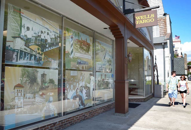 The windows of the new Wells Fargo Bank branch in the old Woolworths building on King Street in St. Augustine features historic photographs of the city. By PETER WILLOTT, peter.willott@staugustine.com'