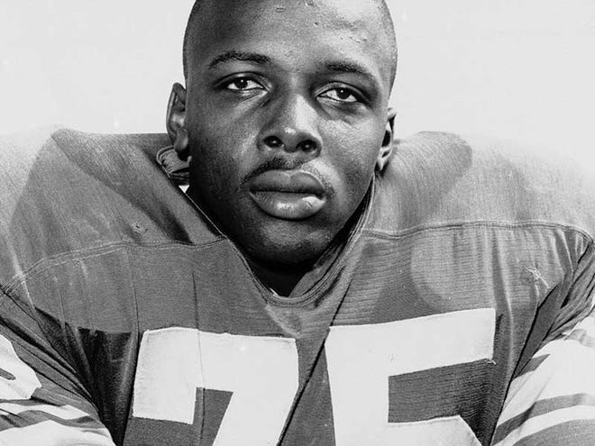 This 1963 file photo shows David Deacon Jones. Jones, a Hall of Fame American football defensive end credited with terming the word sack for how he knocked down quarterbacks, has died. He was 74. The Washington Redskins said that Jones died Monday night of natural causes at his home in Southern California.