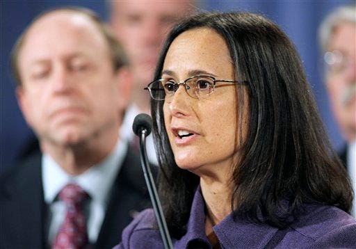 Illinois Attorney General Lisa Madigan speaks during a news conference at the Justice Department in Washington, Thursday, Feb. 9, 2012, to discuss a settlement regarding mortgage loan servicing and foreclosure abuse. (AP Photo/Cliff Owen)