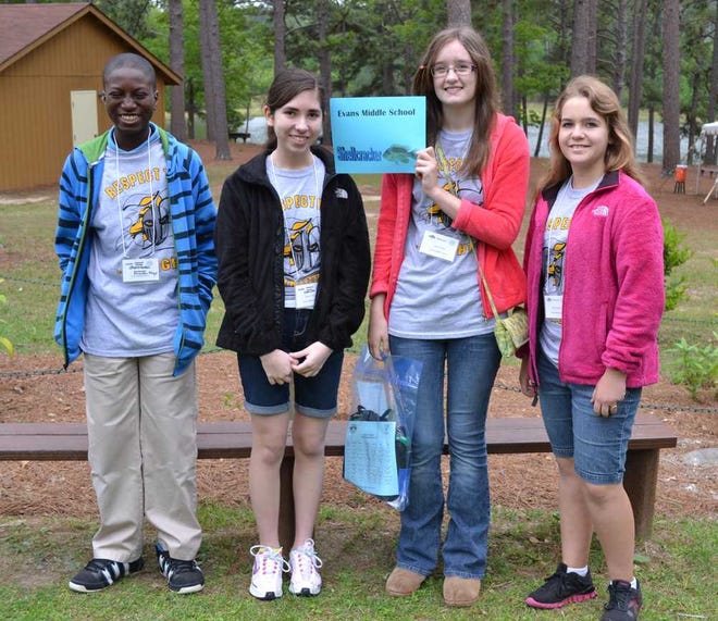 Special Photo Evans Middle School students Amadou Mbye (from left), Kaitlyn Carter, Sara Kitchens and Shelby Plooster perticipated in a recent EcoMeet..