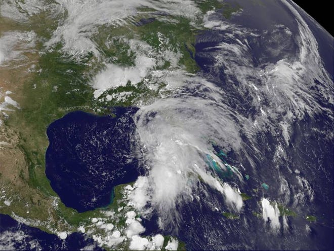 In this Wednesday GOES satellite photo provided by NASA/NOAA, Andrea, the first named storm of the Atlantic season, forms over the Gulf of Mexico. The tropical storm is likely to bring wet weather to parts of Florida's west coast by the end of the week.