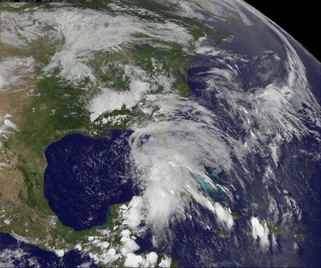 In this Wednesday, June 5, 2013 GOES satellite photo provided by NASA/NOAA, Andrea, the first named storm of the Atlantic season, forms over the Gulf of Mexico. The tropical storm is likely to bring wet weather to parts of Florida's west coast by the end of the week. (AP Photo/NASA/NOAA)