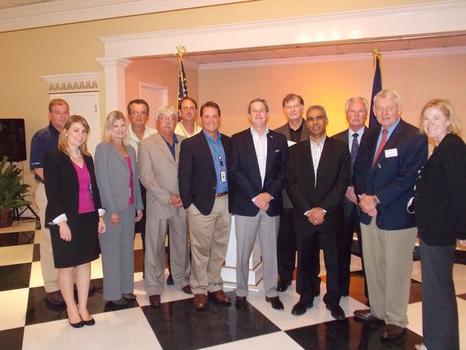 U.S. Senator (R) David Vitter stands with CF Industries representatives and employees at Palazzo Bernardo's in Donaldsonville before receiving the NAM award for Manufacturer's Legislative Excellence last week.