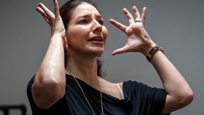 Deborah Marquez, founder and artistic director of School of Ballet Arts and Arts Dance Generation Company, demonstrates expressions of emotion during rehearsals for a production of “Dracula.” (Thomas Cordy/The Palm Beach Post)