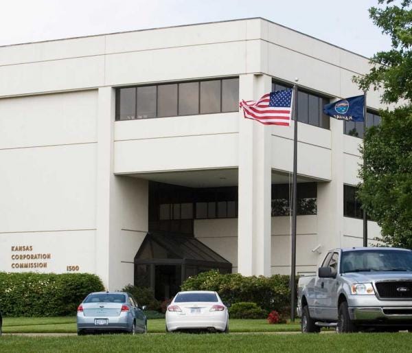 A consultant's audit pointed a critical finger at the chairman and the executive director of the Kansas Corporation Commission, whose main office is at 1500 S.W. Arrowhead Road.