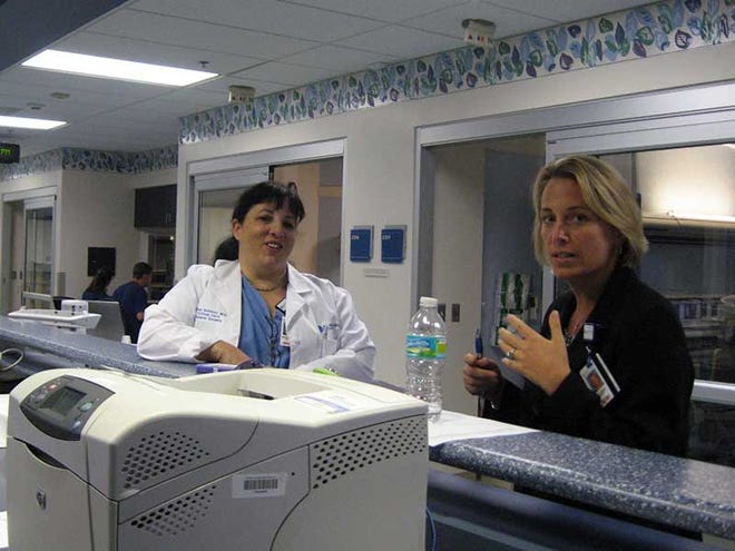 Dr. Miren Schinco, left, medical director of Florida Hospital Flagler's new intensivist program, and Judi LoDolce, emergency department and critical care director, in the hospital's intensive care unit.
