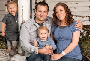 Josh and Anna Duggar with their daughter Mackynzie and son Michael | Photo Credits: Scott Enlow/TLC