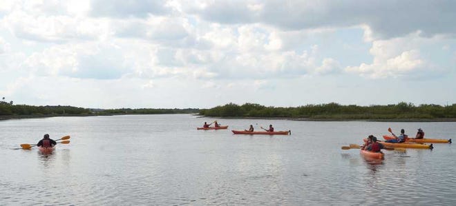 Participants in the Marineland Military Support Retreat go on a kayak tour of the Intracoastal Waterway on Friday, June 7, 2013. By PETER.WILLOTT, peter.willott@staugustine.com