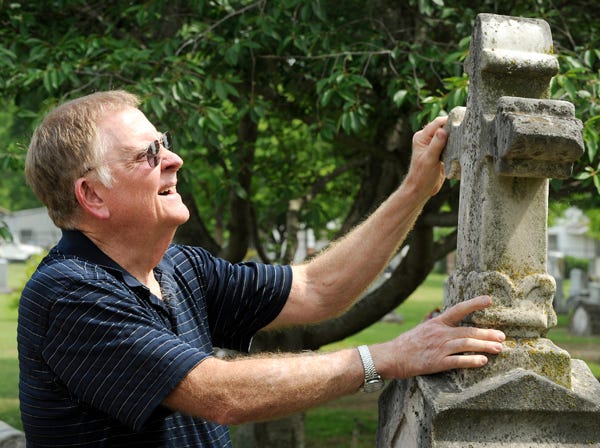 George White, president of the Forrest Cemetery board of trustees, has repaired several of the older monuments in the cemetery.