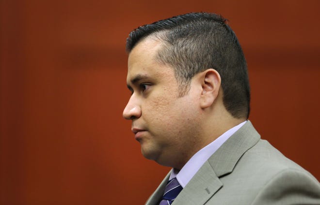 George Zimmerman, accused in the Trayvon Martin shooting, leaves a Seminole County courtroom at the end of a pre-trial hearing, in Sanford, Fla., Saturday, June 8, 2013. Circuit Judge Debra Nelson halted the hearing Saturday after an audio expert was unable to testify because he was stuck at an airport. She will issue a ruling after testimony is concluded. (AP Photo/Orlando Sentinel, Joe Burbank, Pool)