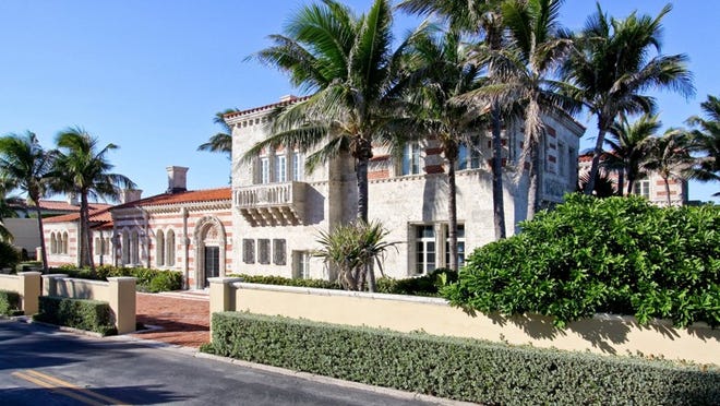 Architect Maurice Fatio designed oceanfront Casa Eleda, which was built in 1928. Its alternating bands of red brick and coral Key stone inspired its nickname, the 'ham-and-cheese' house. The property just changed hands for $15.975 million.