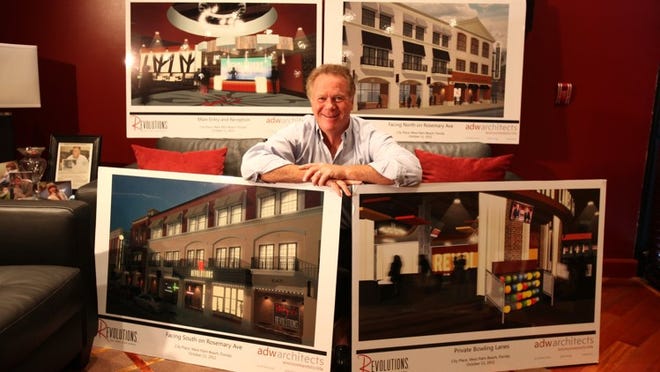 Bruce Frank, owner of Frank Enterprises and Frank Theatres, with renderings of the upcoming Revolutions project for CityPlace.