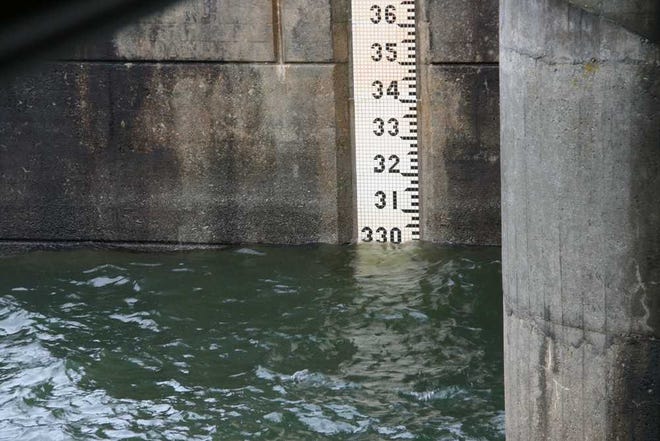 Thurmond Lake reached full pool of 330 feet during the weekend for the first time since 2009, as shown on the tile gauge at Thurmond Dam.