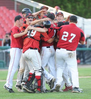 Hingham players celebrate at the conclusion of their 7-4 victory over Stoughton on Sunday in the Div. 2 South Sectional championship game at Campanelli Stadium in Brockton.