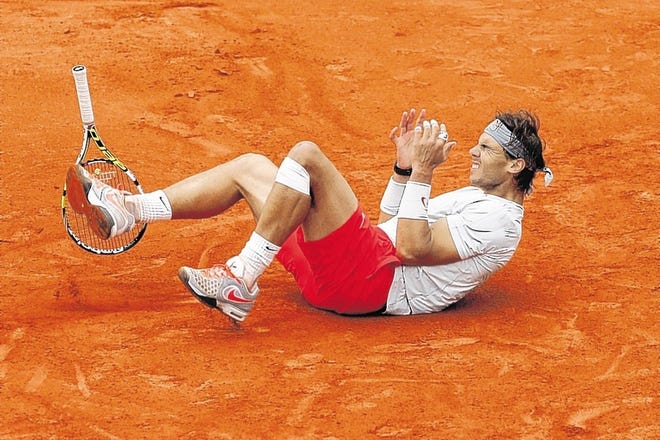 Rafael Nadal celebrates after beating David Ferrer in three sets to win the French Open on Sunday.