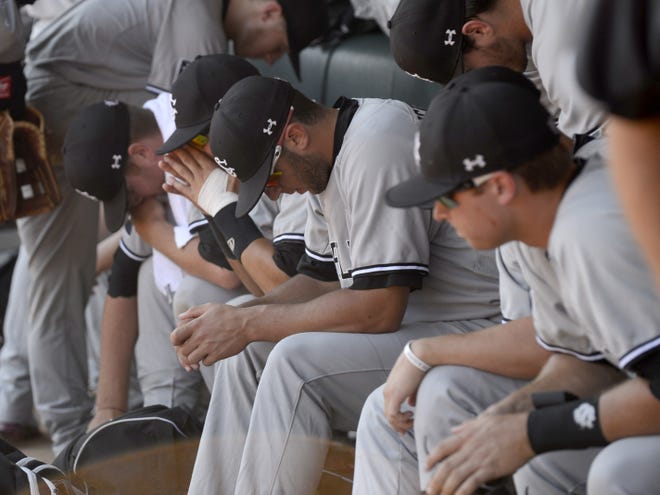 South Carolina players are dejected in the dugout after losing to North Carolina on Tuesday in Game 3 of the NCAA super regional in Chapel Hill, N.C.
