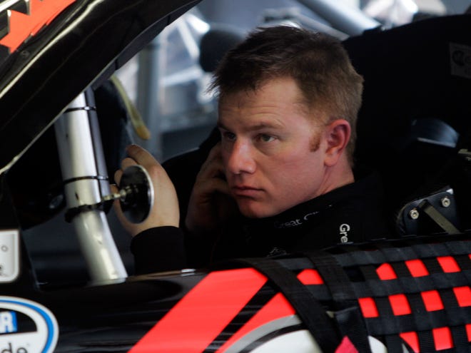 Jason Leffler sits in his No. 38 Great Clips Chevrolet during practice for the NASCAR Nationwide Series Top Gear 300 at Charlotte (N.C.) Motor Speedway on May 26, 2011.