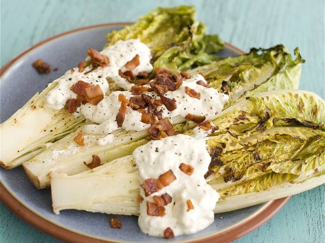 Cookbook author Elizabeth Karmel says Grilled Hearts of Romaine With Blue Cheese Dressing "is the ultimate steakhouse wedge salad."