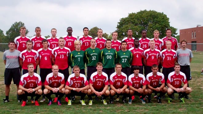 Head coach Jim DeRose (top row right end) and the Bradley men's soccer team gather for a team photo on the opening day of their 2012 training camp Aug. 13 at Guardian Angel Field in West Peoria.
