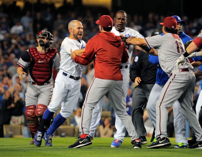 A scuffle breaks out after Los Angeles Dodgers starting pitcher Zack Greinke was hit by a pitch during the seventh inning of their baseball game against the Arizona Diamondbacks, Tuesday, June 11, 2013, in Los Angeles. (AP Photo/Mark J. Terrill)